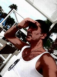 Portrait of man drinking water