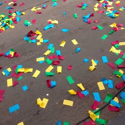 High angle view of multi colored pencils on street