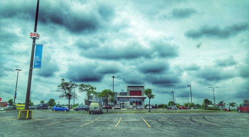 View of road against cloudy sky