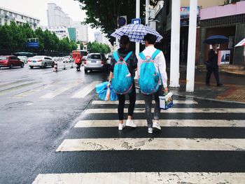 People walking on city street