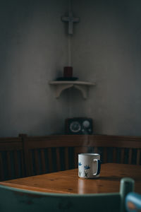 Coffee cup on table at home