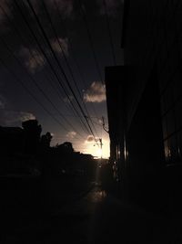 Silhouette of road at sunset