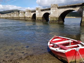 View of bridge over water against sky