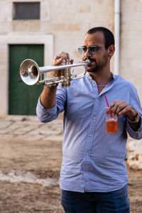 Man playing with trumpet