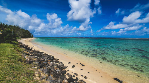 Scenic view of beach against sky