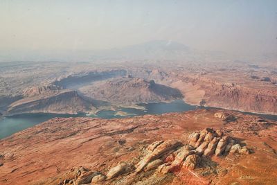 Aerial view of mountain range against sky