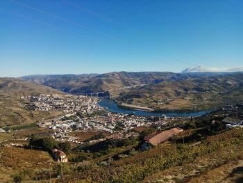 High angle view of landscape against clear blue sky