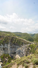 Scenic view of land against sky