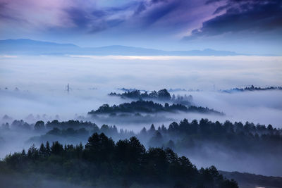 Scenic view of mountains against sky during sunset