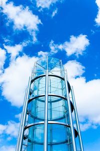 Low angle view of built structure against blue sky