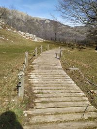 View of footpath leading towards mountains