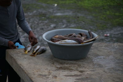 Close-up of person preparing food