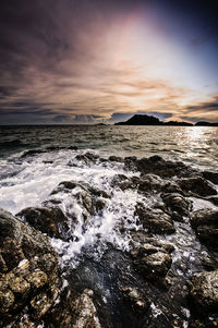 Scenic view of sea against sky during sunset