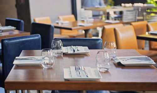 Close-up of chair and table at restaurant