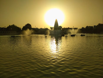 Scenic view of sunset over water