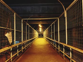 Empty footbridge at night