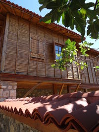 Low angle view of house against building