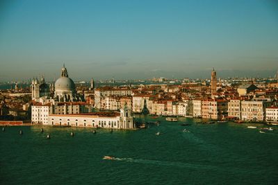 View of buildings in city at waterfront