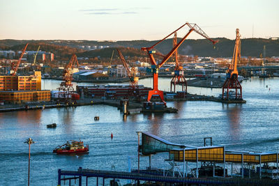 Goteborg industrial harbor port crane at sunset, sweden, gothenburg