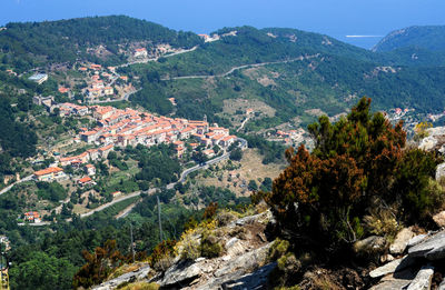 High angle view of trees and mountains against sky