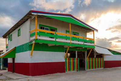 Built structure on beach against sky