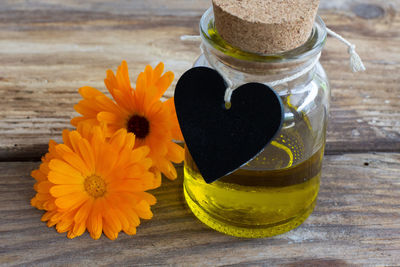 Close-up of yellow flower on table