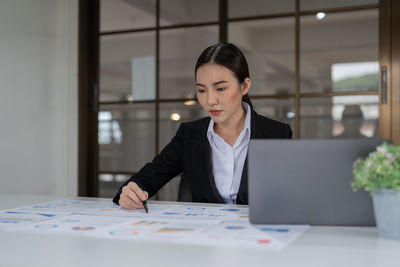 Businesswoman working at office