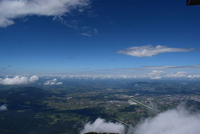 Aerial view of city against sky