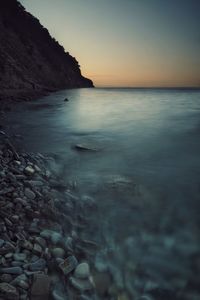 Scenic view of sea during sunrise 