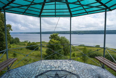 Scenic view of sea against sky seen through window