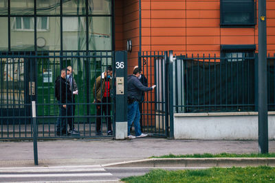 People standing outside building