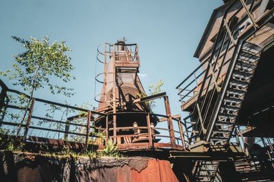 Low angle view of construction site against sky