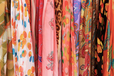Full frame shot of colorful scarves for sale in clothing store