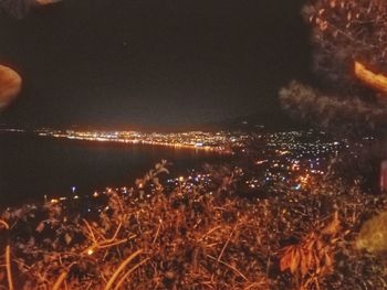 Illuminated cityscape at night