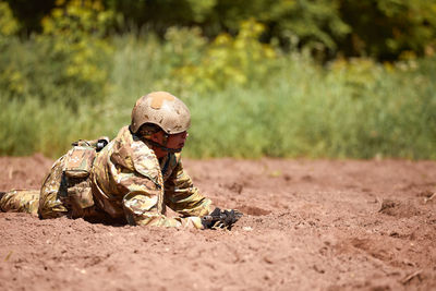 Rear view of man standing on field