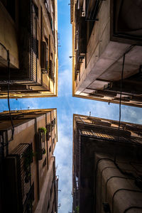 Low angle view of buildings against sky