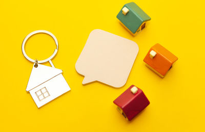 High angle view of yellow paper on table