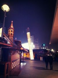 Illuminated street light at night