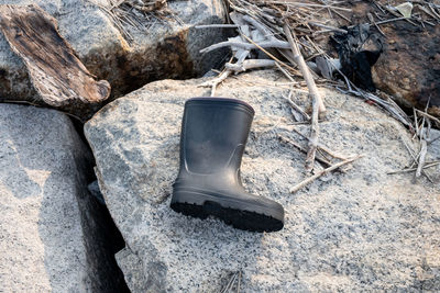 High angle view of shoes on rock