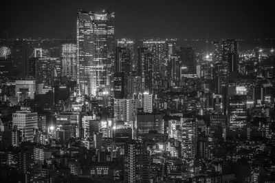 Illuminated cityscape at night