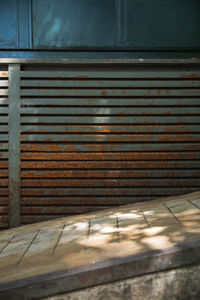 Metal grate of weathered wall