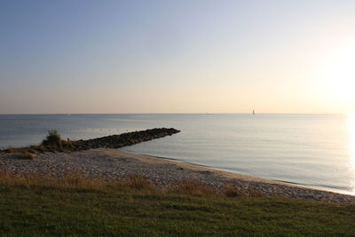 Scenic view of sea against clear sky