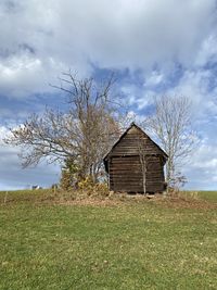 House on field against sky