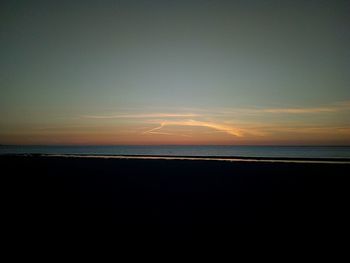 Scenic view of sea against sky at sunset