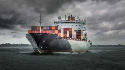 Ship in sea against sky