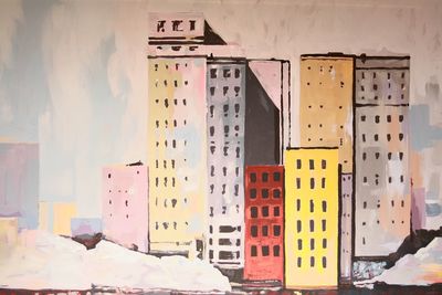 Close-up of text on wall by building