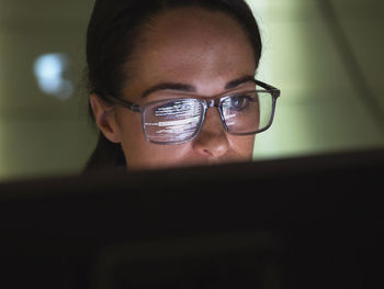 Computer programmer looking at codes