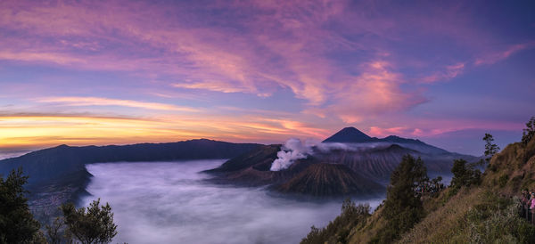 Scenic view of mountains against sky during sunset