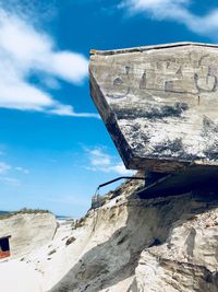 Low angle view of historical building against cloudy sky