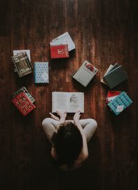 High angle view of child on table